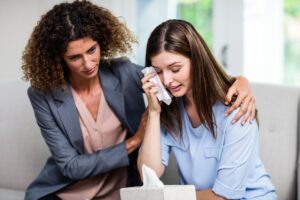 person with disruptive mood dysregulation disorder speaking to a mental health professional for treatment